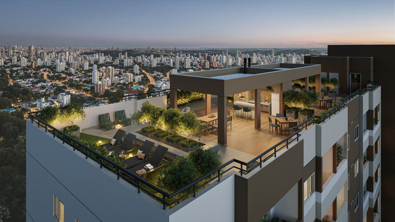 Rooftop no 22º andar com churrasqueiras, solário e vista da cidade ao entardecer